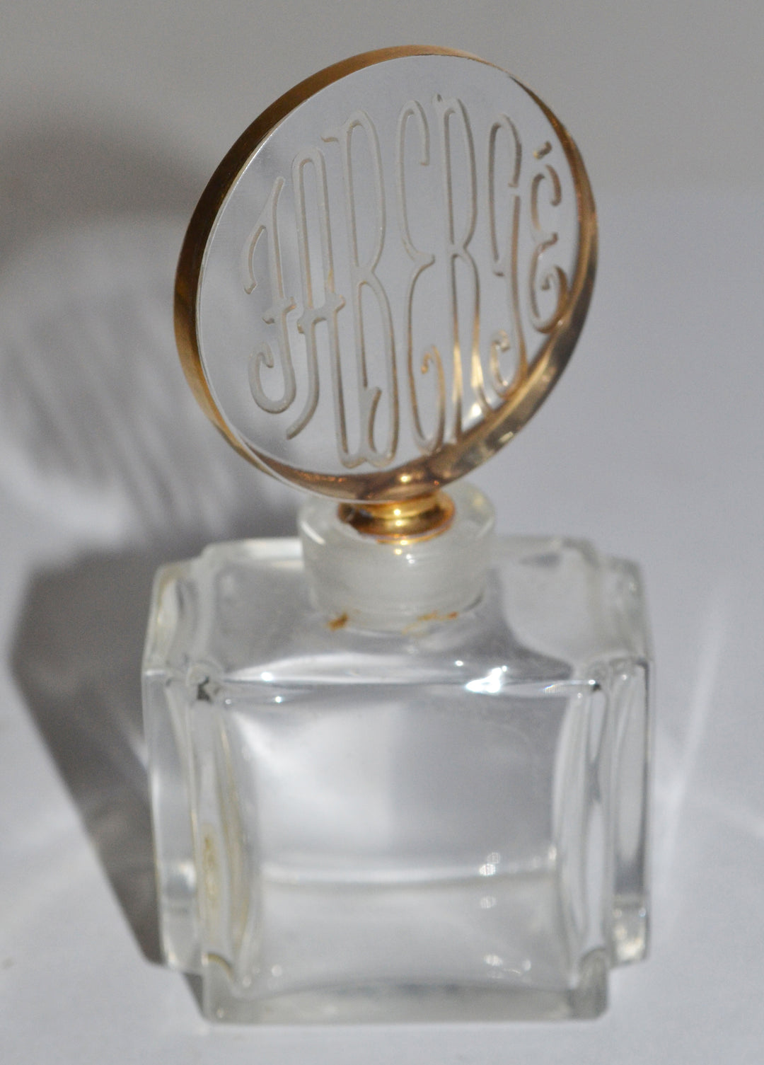 Vintage Fabergé Woodhue cut-crystal perfume bottle